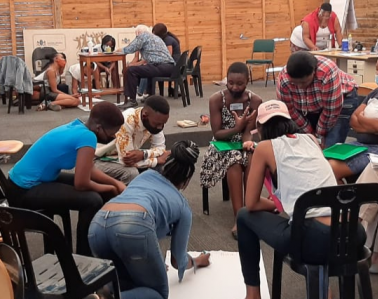 Participants engaging in inner healing activities during the Creators or Peace workshops in Johannesburg. 